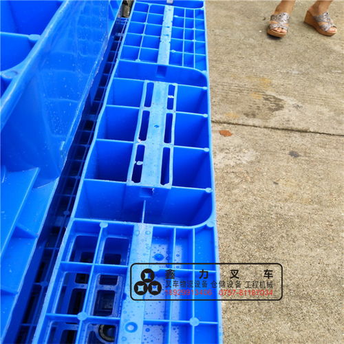 全新塑料托盤墊倉板 九腳叉車托盤的現(xiàn)代化倉儲解決方案
